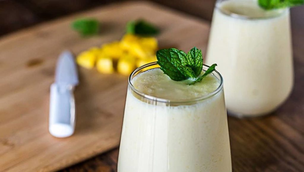 Homemade CBD lassi in glass with mint